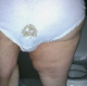 Ms. Poop Alot takes a shit in her panties. Her panties are pulled down to show off the mess left on her ass and the clump of wet, goopy shit in her panties. About 1.5 minutes.